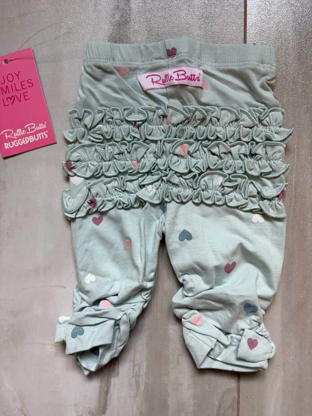 NWT RuffleButts Be Kind Hearts Graphic Tee & Heart Ruffled Leggings Set 0-3M